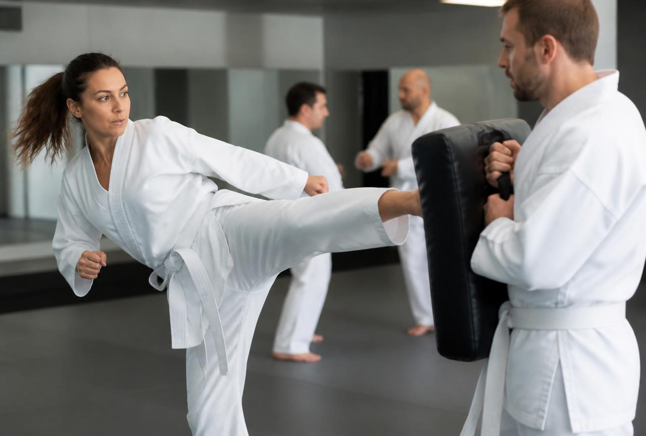 Adult student practicing self-defense techniques in Arvada, CO